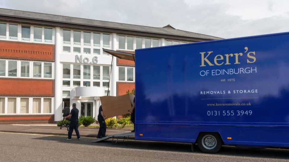 Kerr’s Removals van and team unloading office furniture during a business relocation in Edinburgh