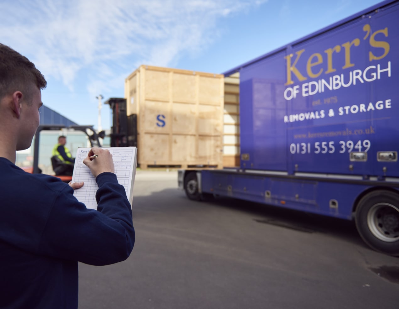 Kerrs wooden container unloaded for storage
