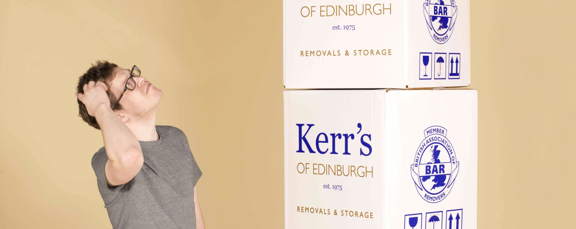 Dispute resolution removals - customer with moving boxes reflecting Kerr's commitment to fair support