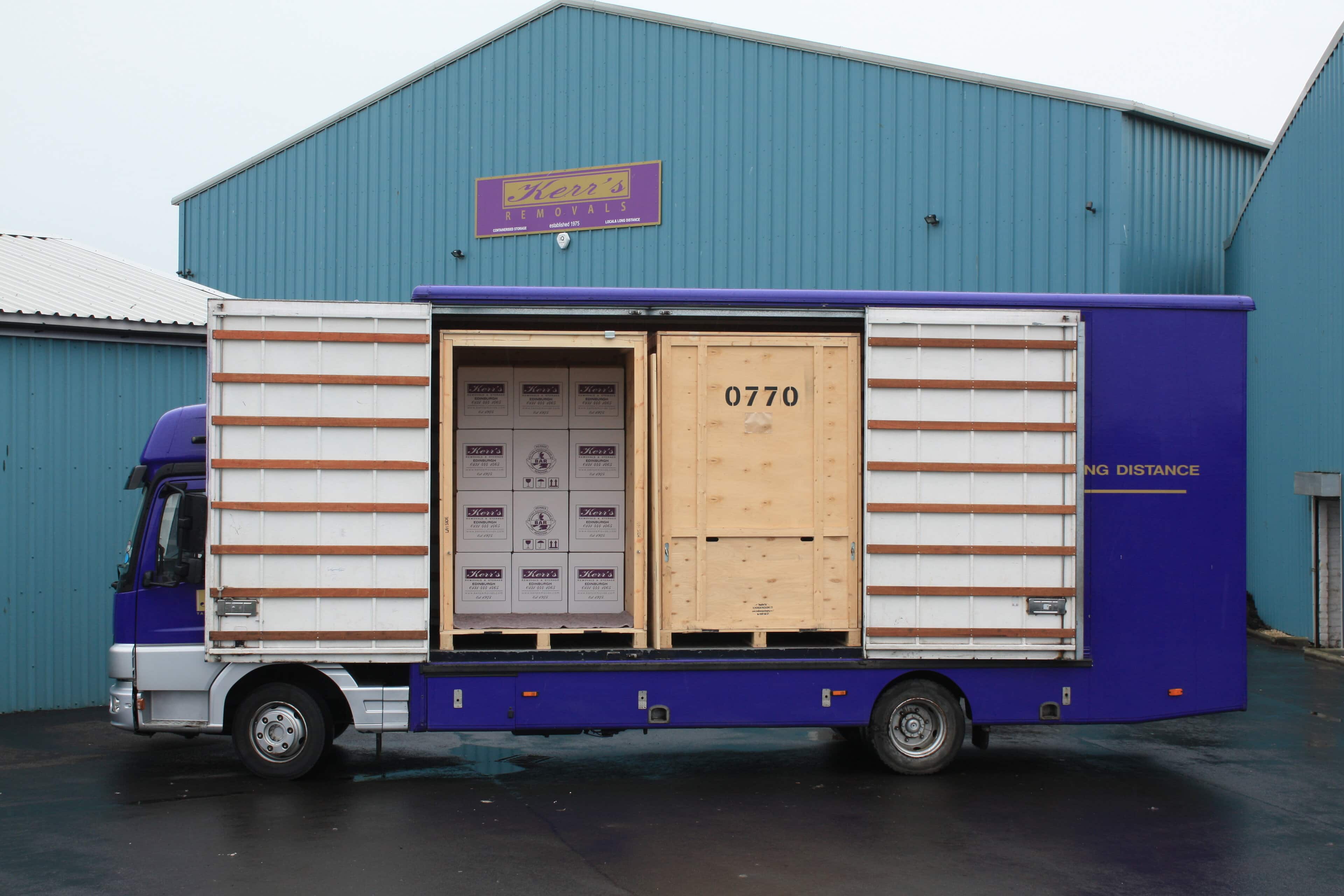 Kerr's removal van parked outside a residential property in Edinburgh